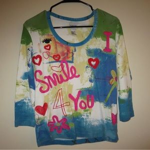 Chico’s Vibrant print & sewn accent top